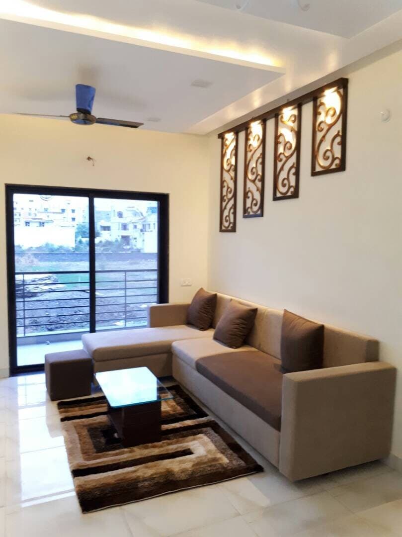 Living room opening to the balcony – Abhinav Sky, Raipur
